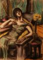 Junge Frau im Sessel